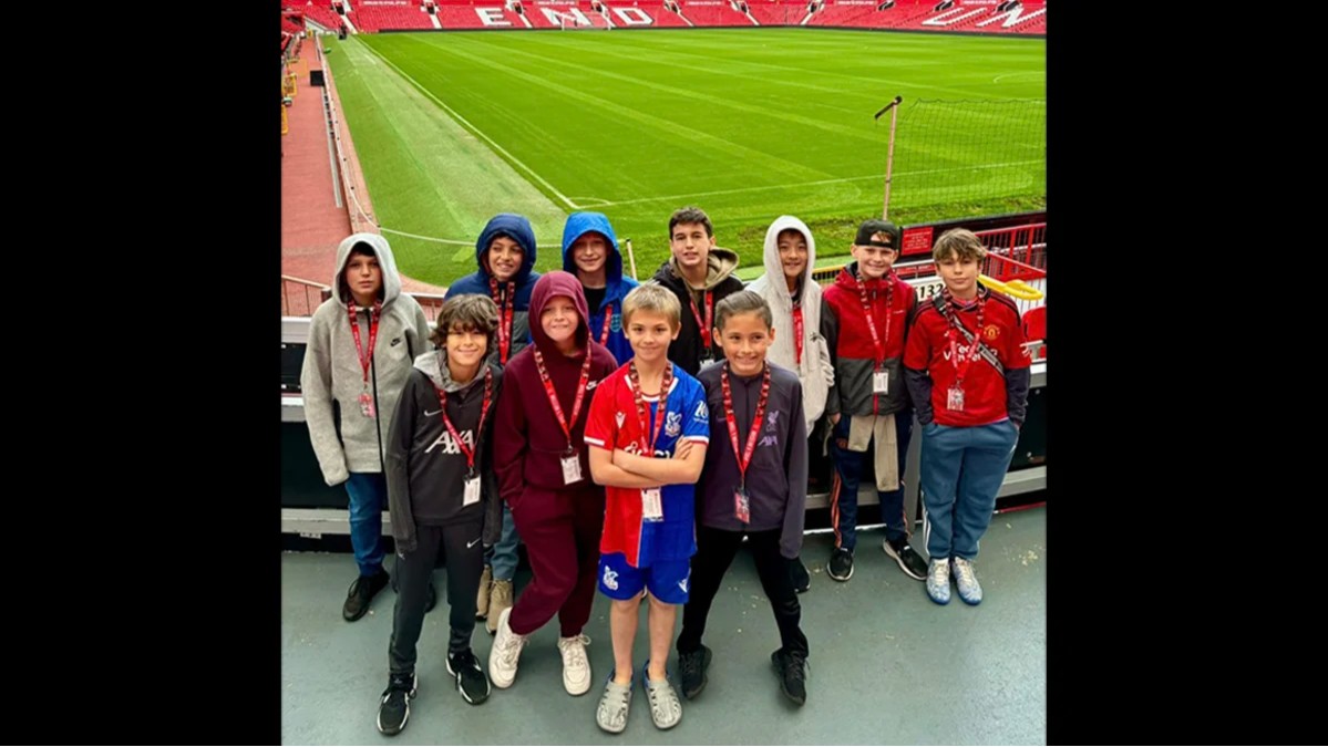 A group of young Storm soccer players visit Old Trafford stadium during an international trip to England
