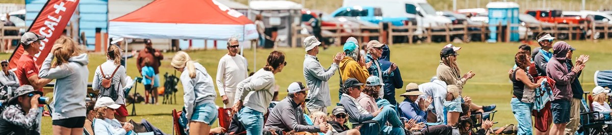 Families and spectators watching a youth soccer game from the sidelines in Colorado 4