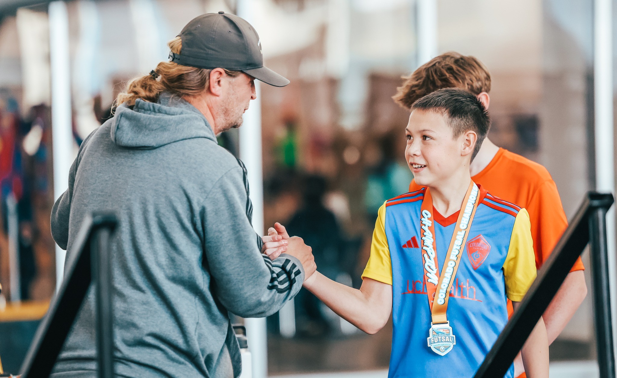 Futsal Player Handshake Coach