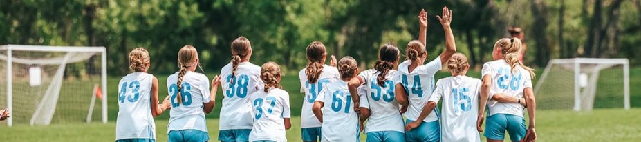 youth soccer girls celebrating goal colorado 5